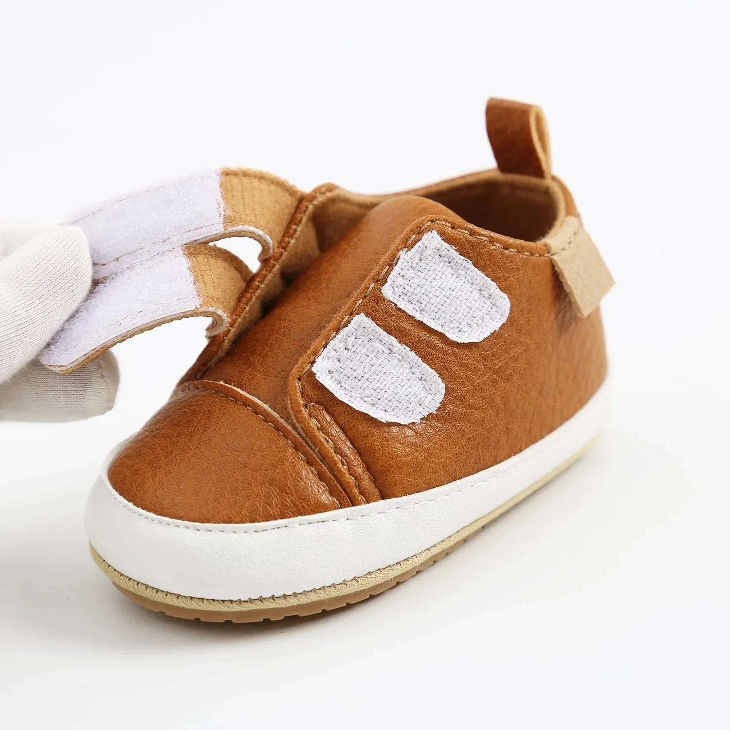 Tan leather look trainer style shoes with Velcro fasten (up to 18 months)