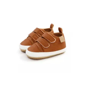 Tan leather look trainer style shoes with Velcro fasten (up to 18 months)